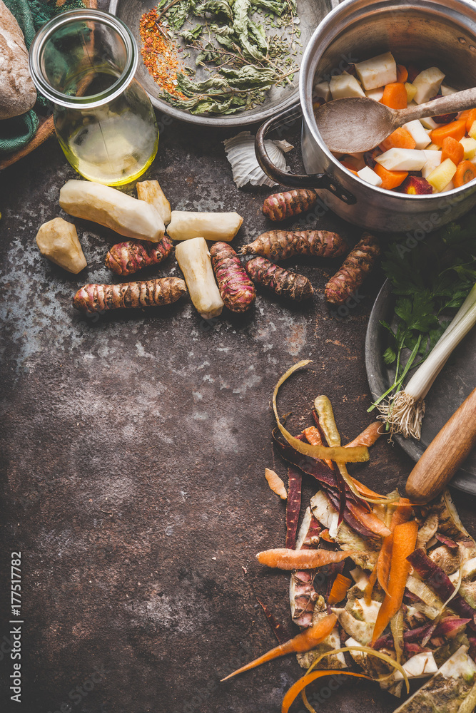 Φωτογραφία Cooking preparation of organic colorful farm root vegetables : Jerusalem artichoke, carrot, celery,parsnip on rustic kitchen table background, top view, place for text