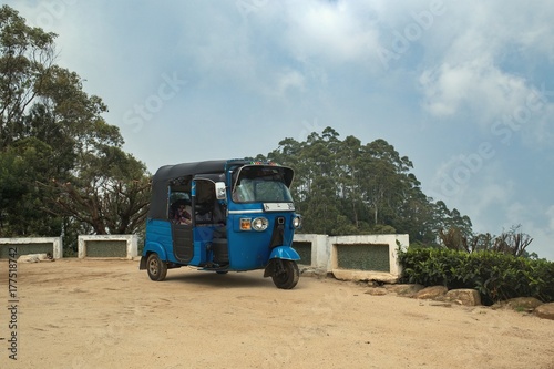 A means of transport called the TUK TUK at the top of the hill  called  Mr. Lipton s Lookout  in Sri Lanka.