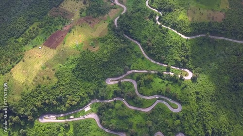 Aerial shot of some Mandalay-Lashio road No. 3 highway serpentines in Nawnghkio and valley with view around Goteik viaduct photo