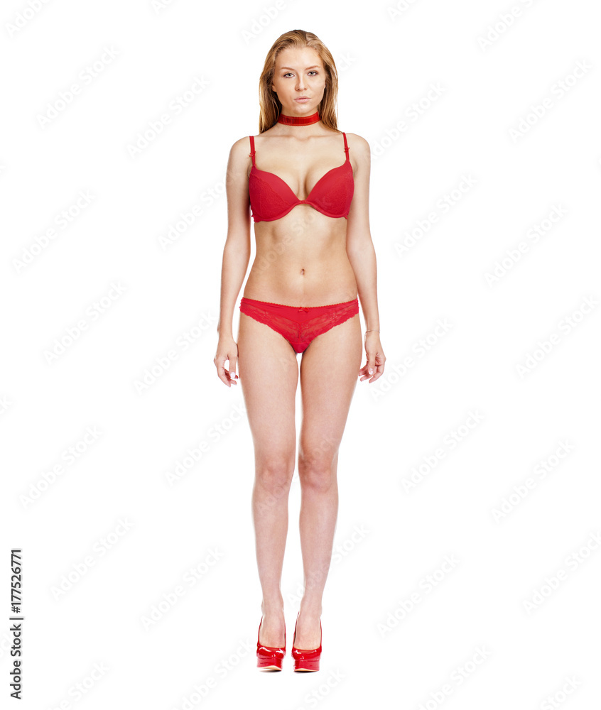 Fototapeta premium Young beautiful blonde woman in black bikini