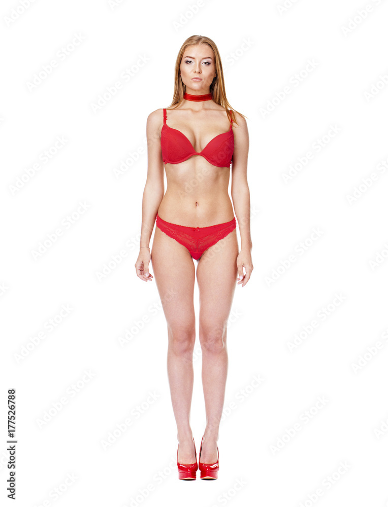 Fototapeta premium Young beautiful blonde woman in black bikini