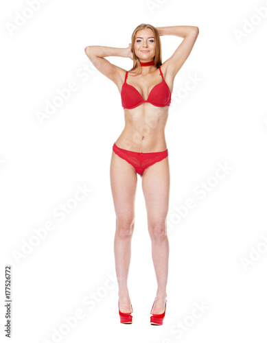 Young beautiful blonde woman in black bikini