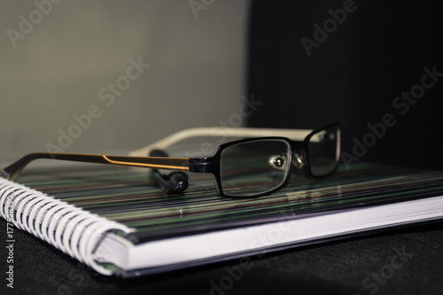 Glasses and notebook