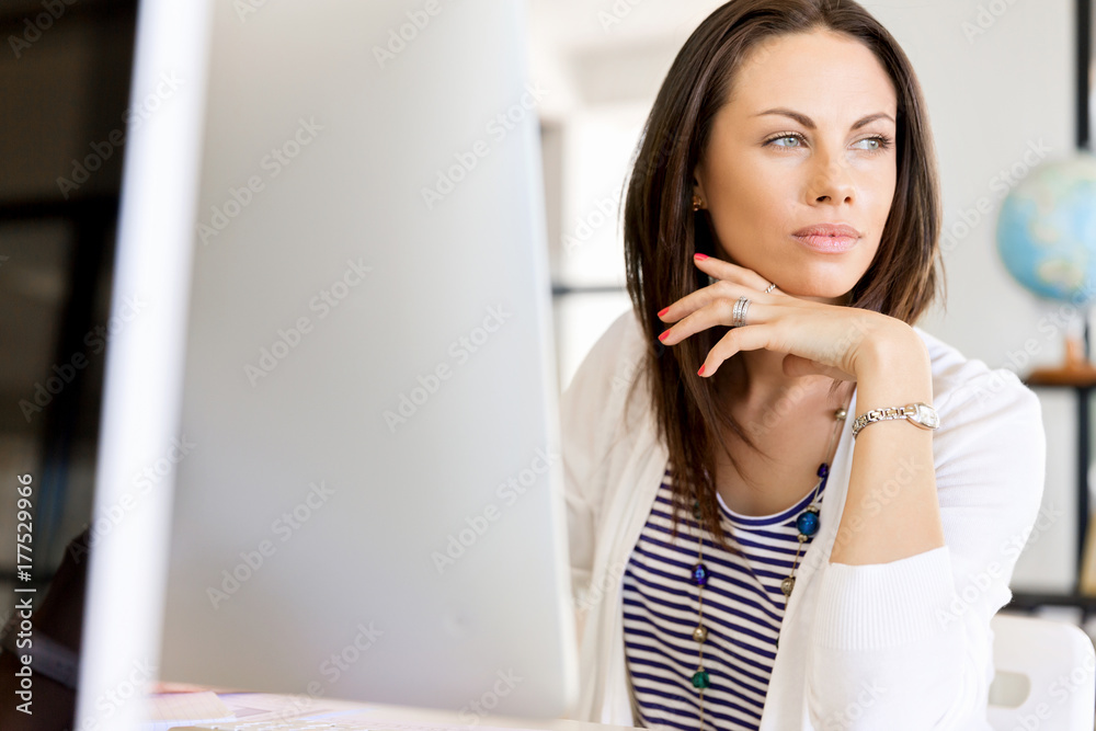 Happy entrepreneur or freelancer in an office or home Happy entrepreneur or freelancer in an office or home