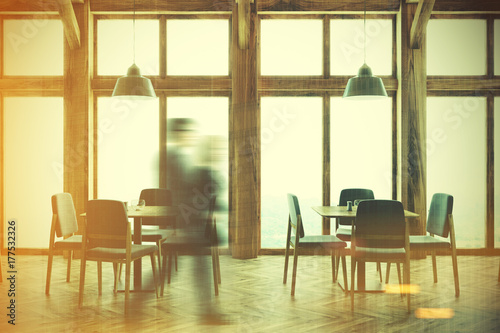 Wooden cafe interior, windows toned