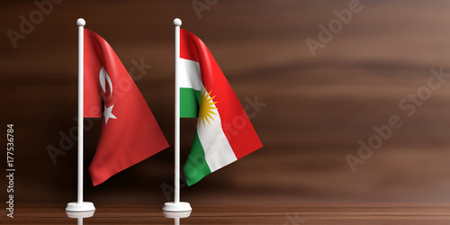 Turkey and Kurdistan relations. Small flags on wooden background. 3d illustration photo