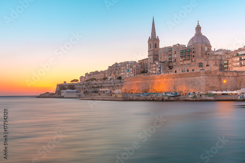 Valletta Skyline with churche of Our Lady of Mount Carmel and St. Paul's Anglican Pro-Cathedral, at dawn, Valletta, Capital city of Malta © Kavalenkava