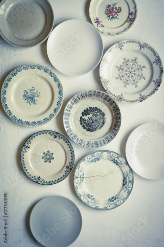Assortmen empty plates decor vintage old fashioned overhead 