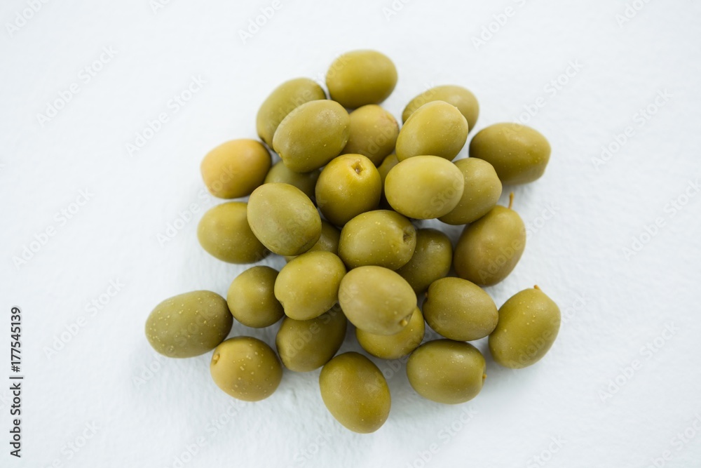 Close-up of marinated green olives