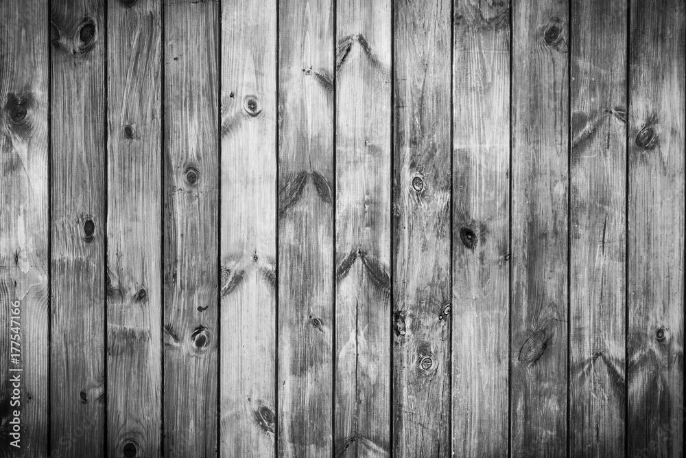 Naklejka premium Painted planks in black and white. Texture of wood.