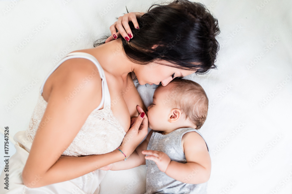 Beautiful Mother Big Breast Breastfeeding Her Foto stock 1067406545