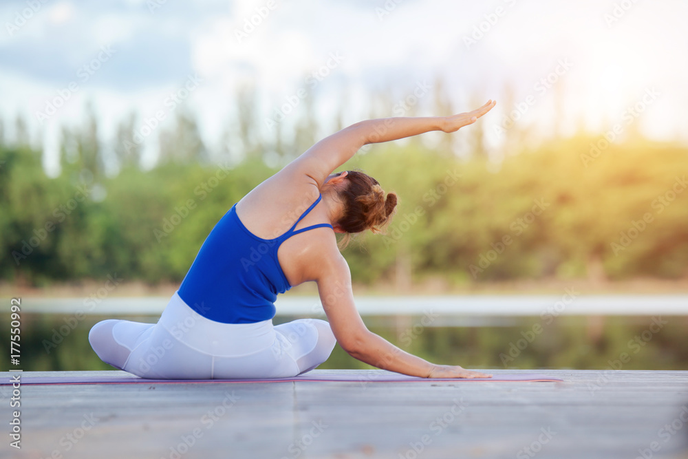  Yoga Woman - relax, Young asian woman practicing yoga pose at yoga healthy sport gym, yoga and meditation have good benefits for health. Photo concept for Yoga Sport and Healthy lifestyle