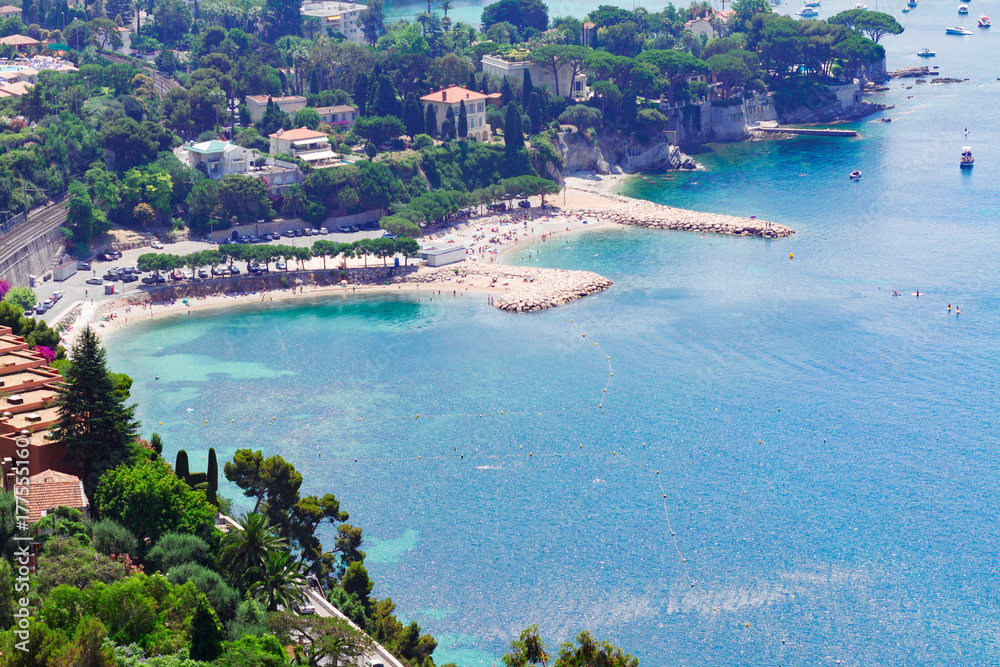 beach and turquiose water of cote dAzur french riviera coast from above, France