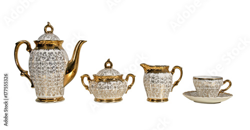 Antique tea set isolated on white photo