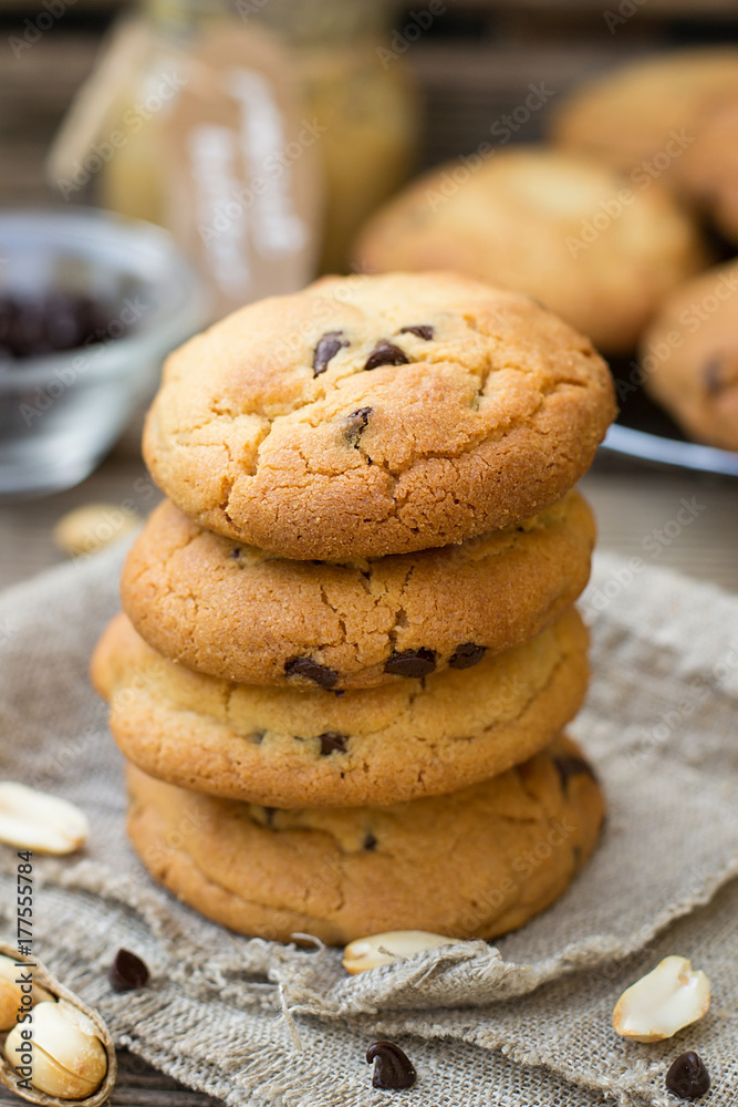 Peanut butter cookies with chocolate chips on wooden background Peanut butter cookies with chocolate chips on wooden background