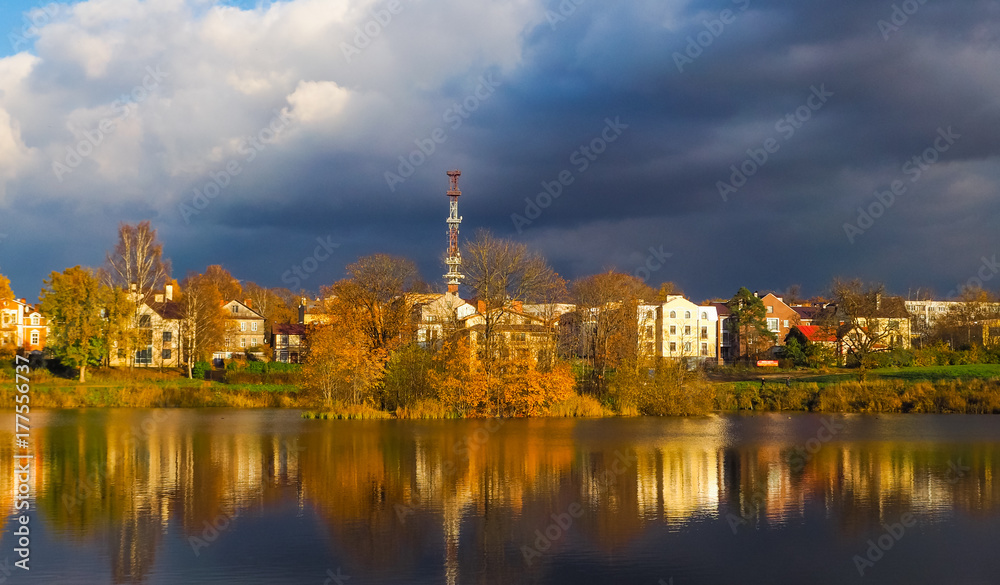 Rural autumn landscape on a lake on a Sunny day. Russia. The ancient town of Gatchina. Autumn 2017.

