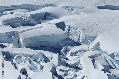 Crevasses with visible layers of ice. Detail of the Aletsch glacier.
