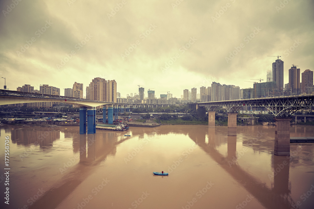 Retro stylized picture of Chongqing waterfront, China.