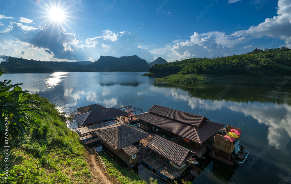 Beautiful views of wooden house floating on river in Mae Suai Dam Chiang Rai Province Thailand.