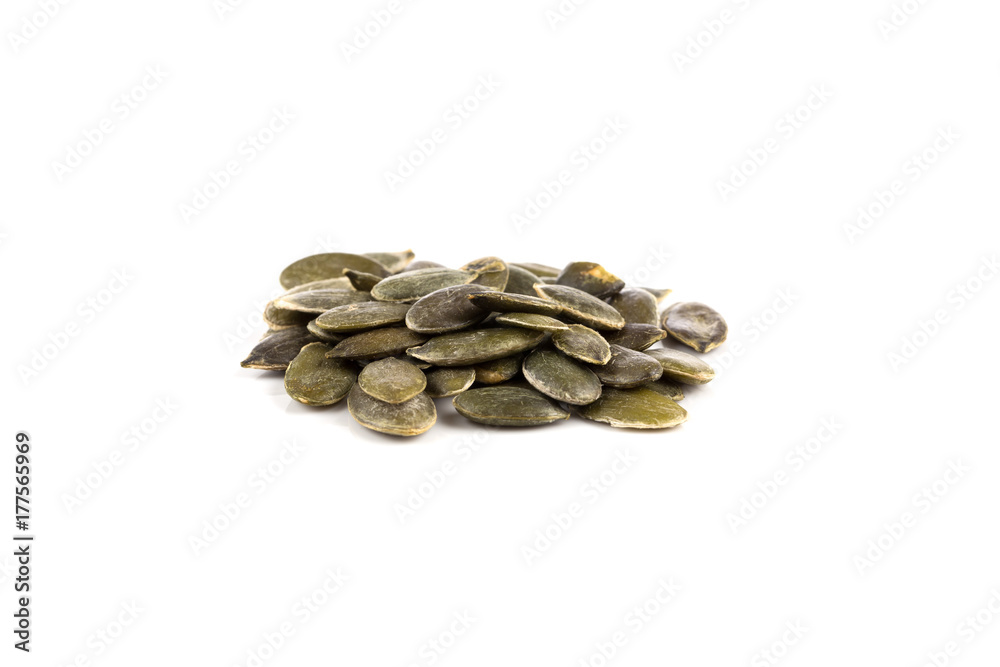 Pumpkin seeds on a white background Pumpkin seeds on a white background