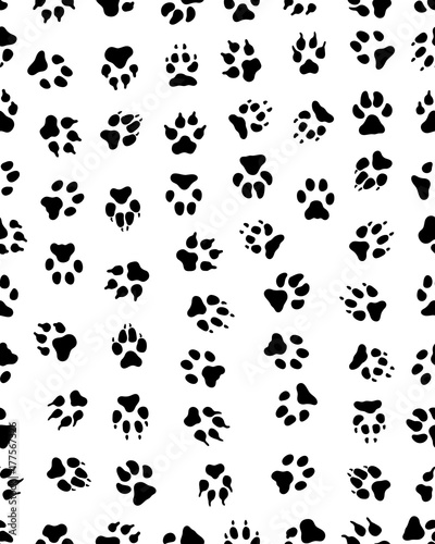 Seamless pattern of black silhouettes of prints of dog paw