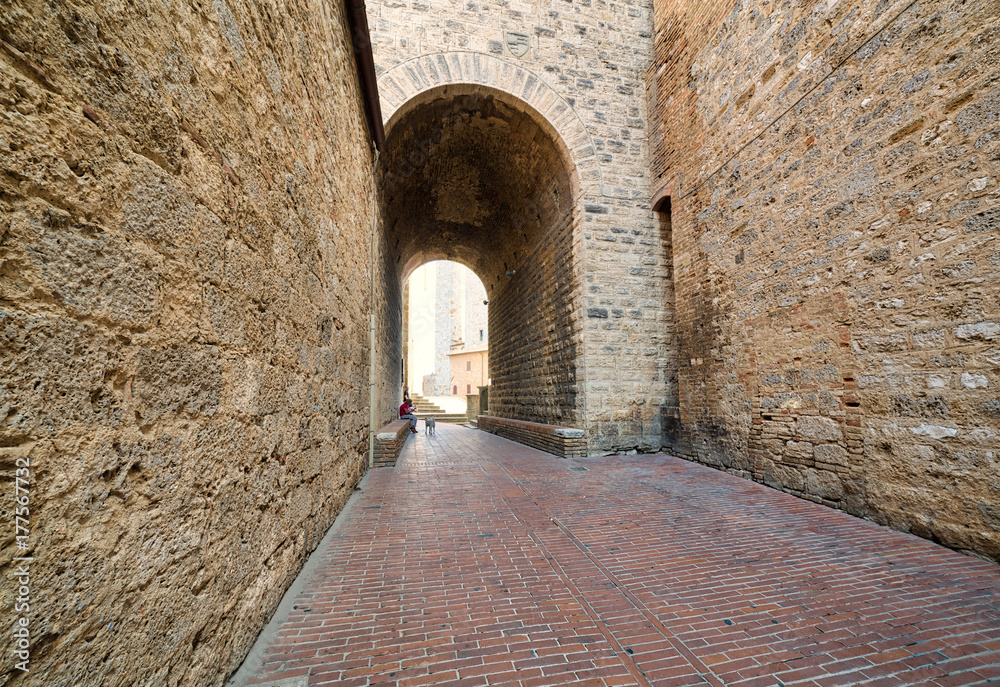 stone arch in street of San Gimignano