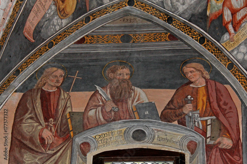 tre apostoli; affresco del presbiterio della chiesa di San Vigilio a Pinzolo photo