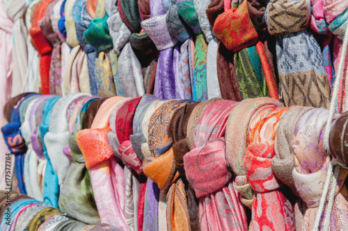 Showcase street of minimarket women's colorful scarves .