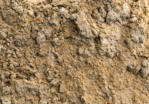 Gray sand mound pile beach part background texture