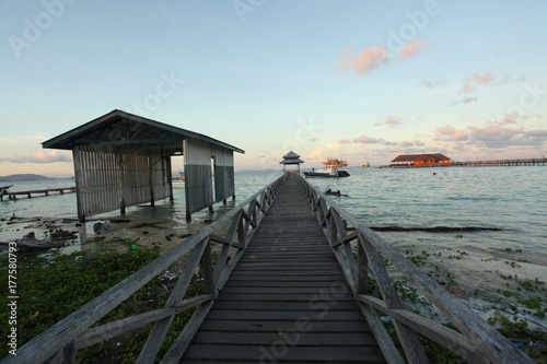 wooden bridge going into the ocean © agarianna