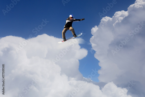 Snowboarder making jump