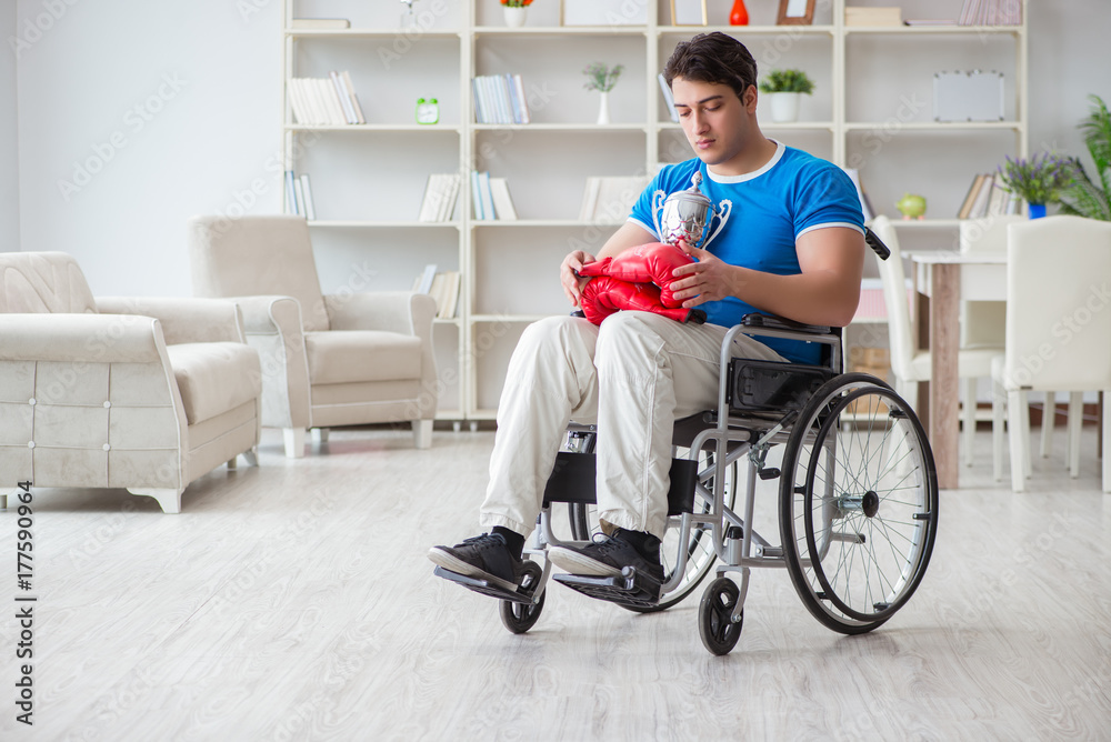 Disabled boxer at wheelchair recovering from injury Disabled boxer at wheelchair recovering from injury