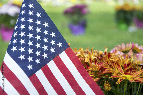 flag and flowers on memorial day