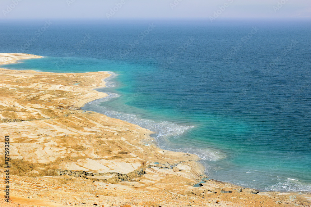 landscape of the Dead Sea, failures of the soil and the strong shallowing of the sea, illustrating an environmental catastrophe on the Dead Sea, Israel