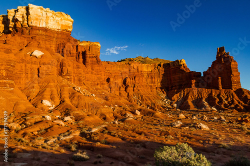 Glowing epic sunset of the famous Chimney Rock in Capitol Reef National Park near Torrey Utah.
