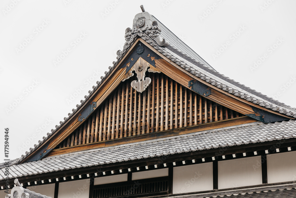 Close up detail roof of Edo period architecture style with leaves less tree in Noboribetsu Date JIdaimura Historic Village at Hokkaido, Japan. Close up detail roof of Edo period architecture style with leaves less tree in Noboribetsu Date JIdaimura Historic Village at Hokkaido, Japan.