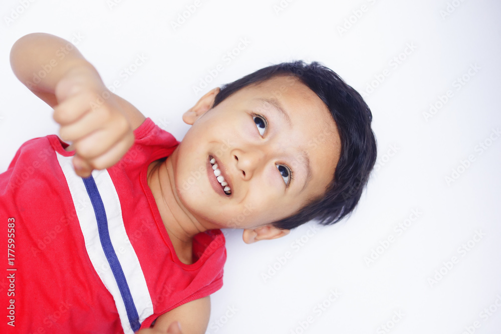 Cute asian child positive and real smile over white background Cute asian child positive and real smile over white background
