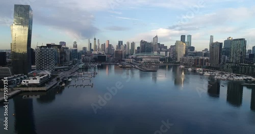 Wallpaper Mural Docklands waterfront at sunset flying forward towards stadium and marina with towers.
 Torontodigital.ca