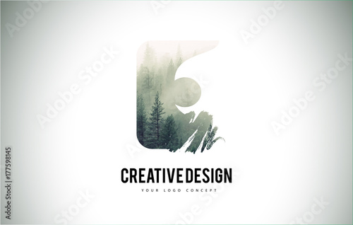 E Letter Brush with Forest Fog Texture. Forest Trees Letter Logo Design.