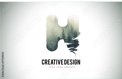 H Letter Brush with Forest Fog Texture. Forest Trees Letter Logo Design.