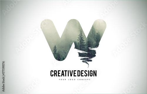 W Letter Brush with Forest Fog Texture. Forest Trees Letter Logo Design.