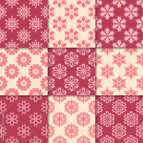 Cherry red and beige floral ornaments. Collection of seamless patterns