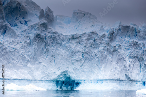 Blue ice shines through this ice cave.