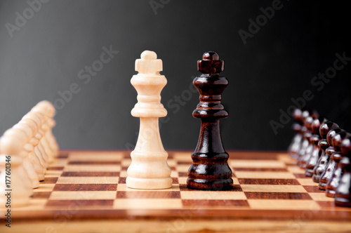 Chess pieces on chessboard: the concept of negotiations photo