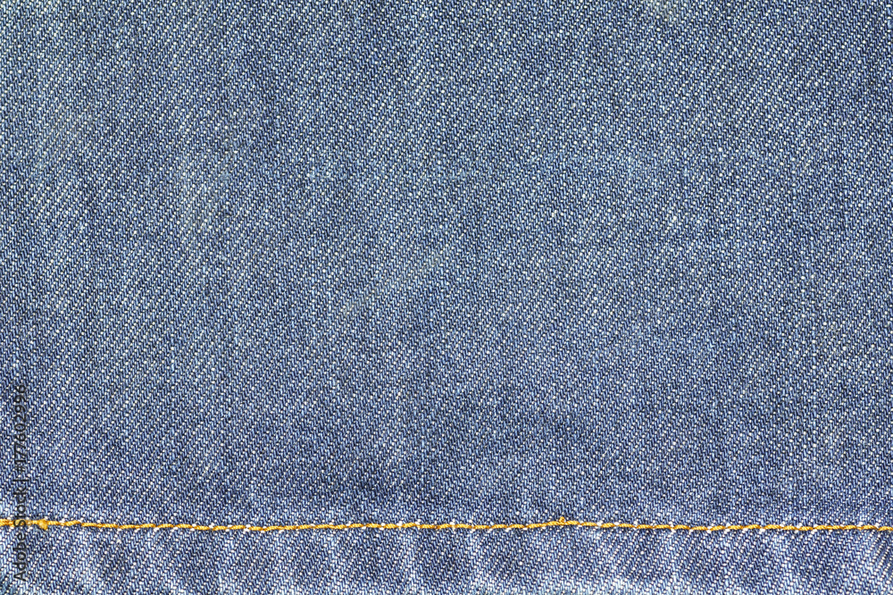 Denim jeans fabric texture or denim jeans background with seam for beauty clothing. fashion business design and industrial construction idea concept. Denim jeans fabric texture or denim jeans background with seam for beauty clothing. fashion business design and industrial construction idea concept.