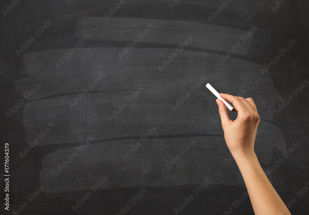Naklejka premium Hand holding chalk