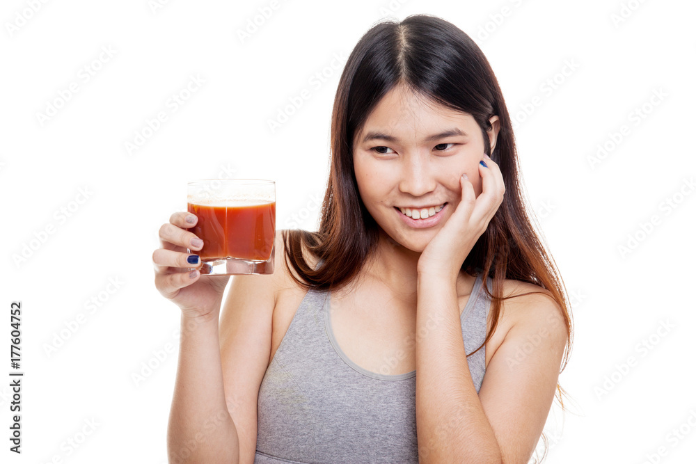 Beautiful healthy Asian girl like tomato juice. Beautiful healthy Asian girl like tomato juice.