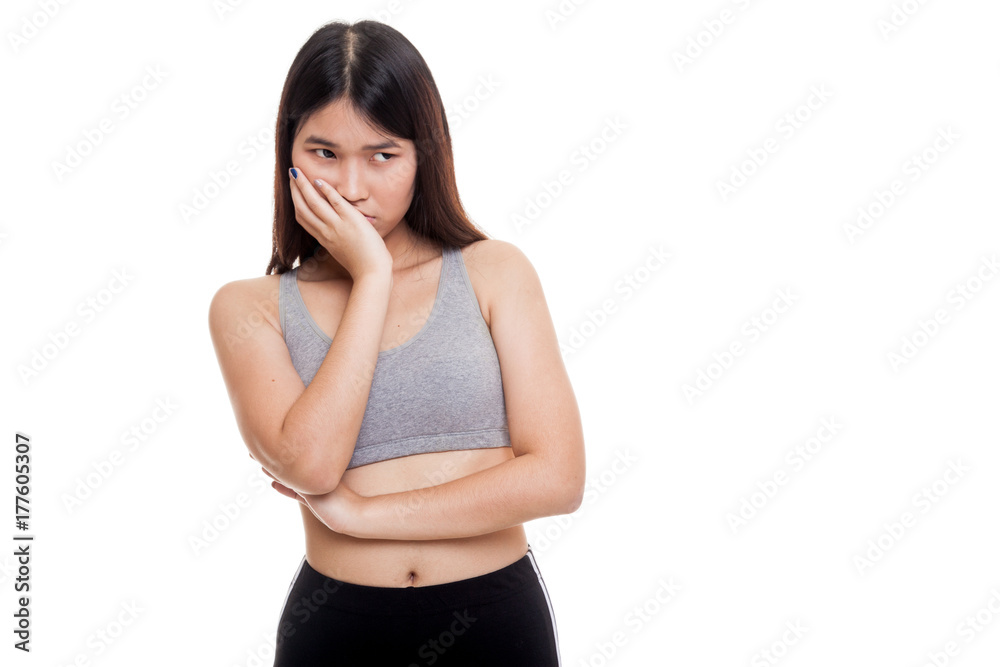 Beautiful young Asian woman in sport dress get bored. Beautiful young Asian woman in sport dress get bored.