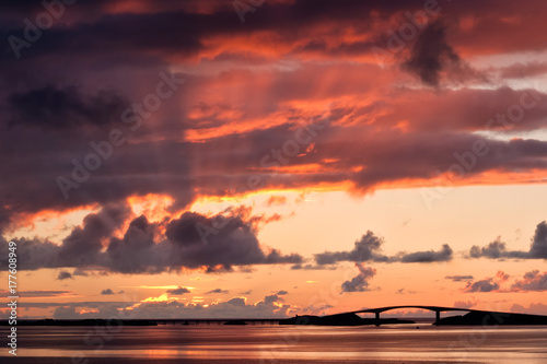 The Atlantic road in silhouette against the sunset in Norway