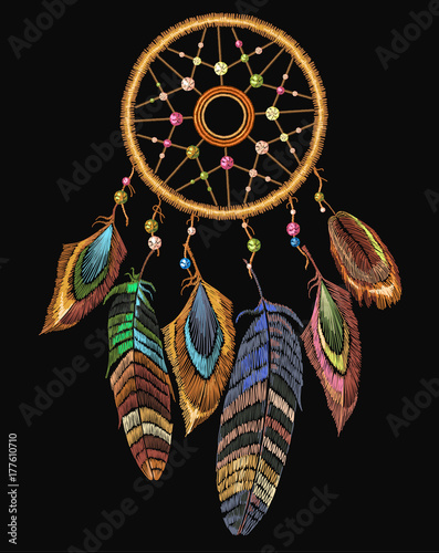 Embroidery dreamcatcher boho native american indian talisman dreamcatcher. Clothes ethnic tribal design. Magic tribal feathers. Fashionable template for design of clothes